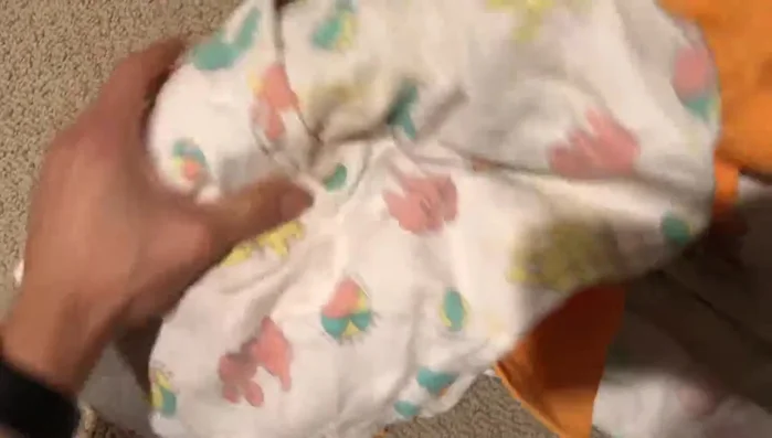 Wrap the glove in towels and blankets, applying pressure to help absorb moisture.