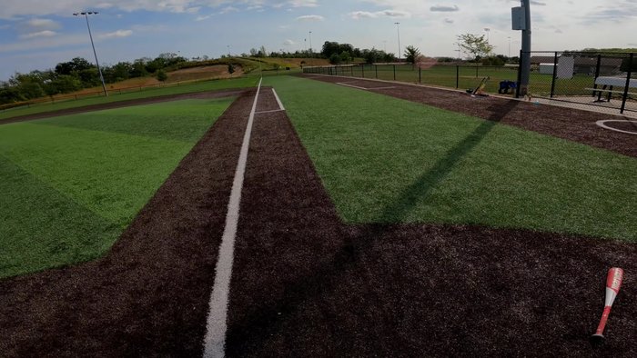 Gather different baseball bats suitable for an 8-year-old. Consider using a bat calculator to determine appropriate size and weight based on the child's height and weight.