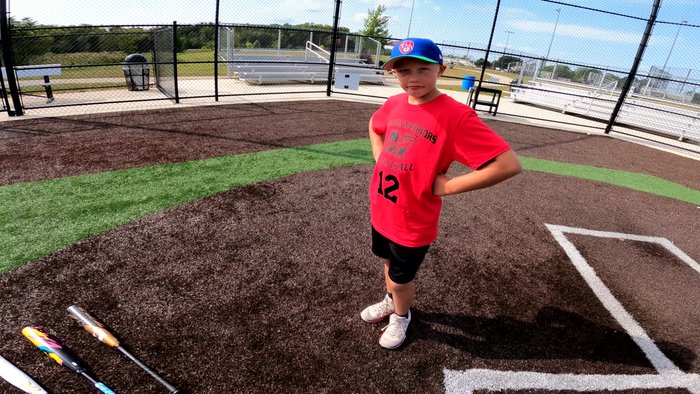 Have the child hit several balls with each bat to evaluate performance and feedback.