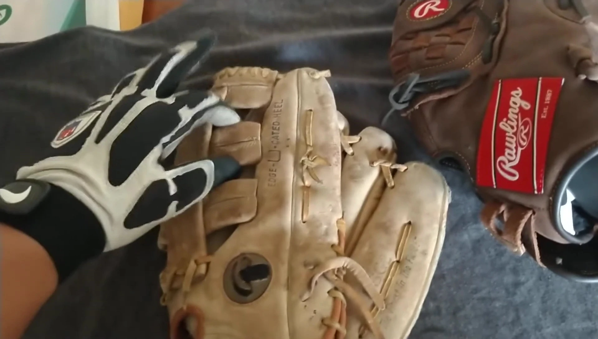 Speaker demonstrating his preference for an open web glove