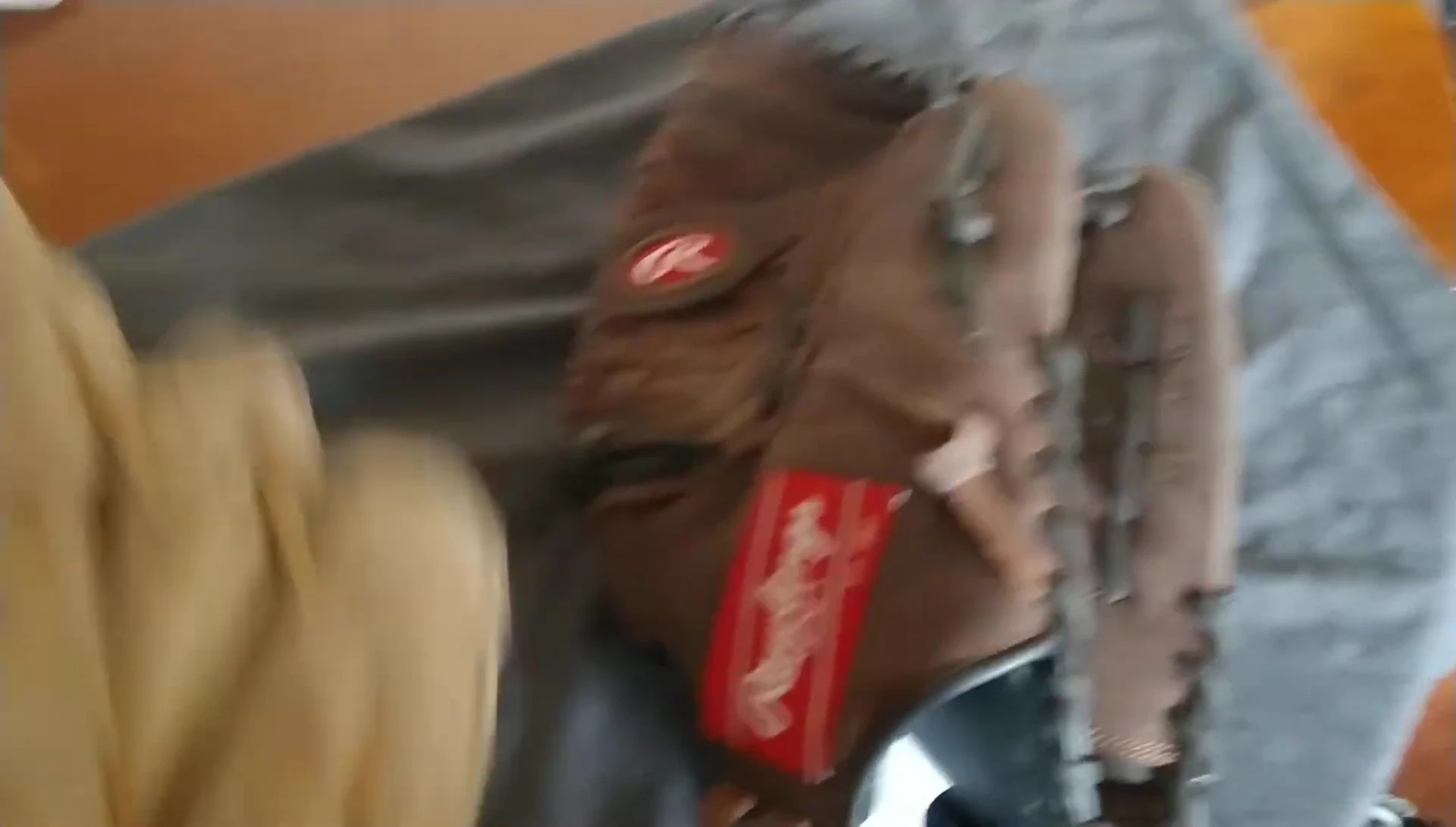 Comparison shot of a well-broken-in glove and a stiff new glove