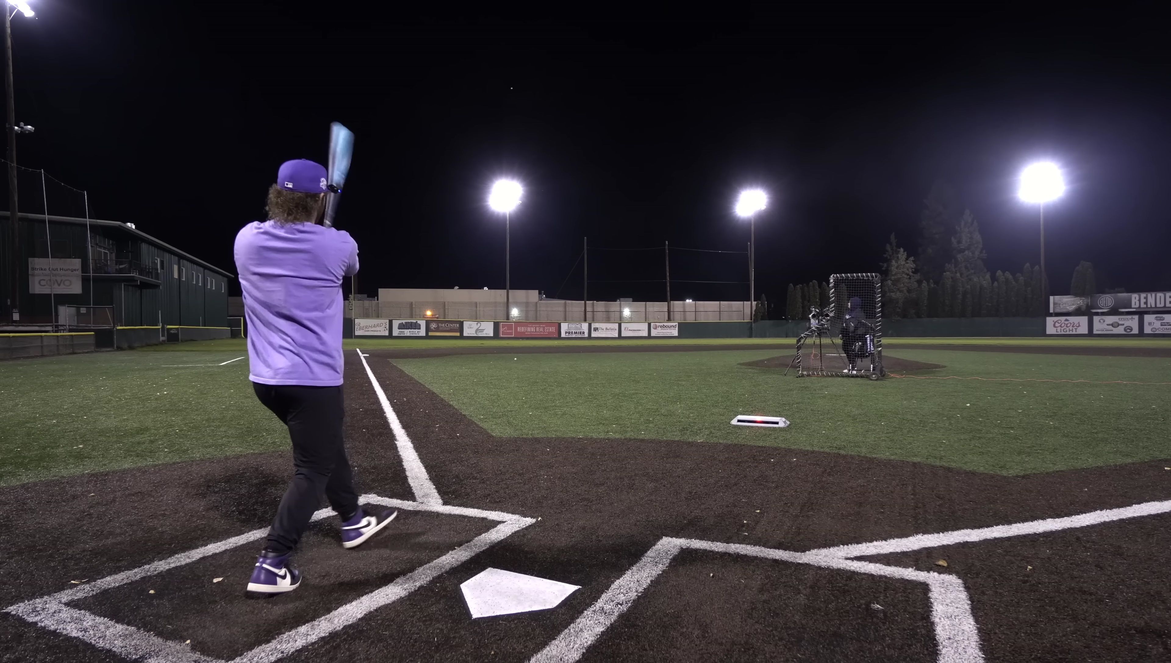 A clear shot of a swing with the bat emphasizing barrel speed and contact.