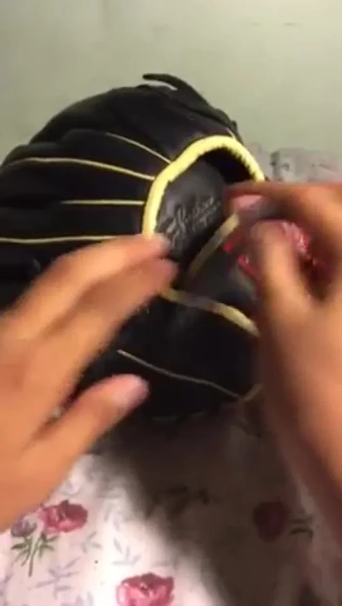 Pull the lace tight to form the 'X'.