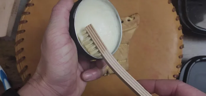 Dip your chosen brush into the Ball Players Bomb Glove Cleaner, then into the clean water to activate the cleaner.