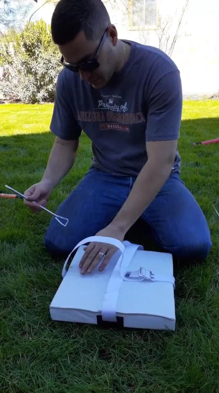 Pull the strap taut and tighten it down as much as possible.