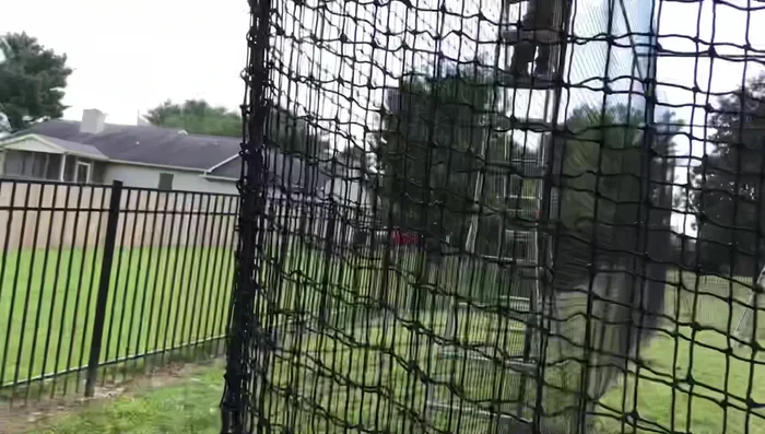 Add extra netting temporarily to any low corners if needed before adding concrete and turf.