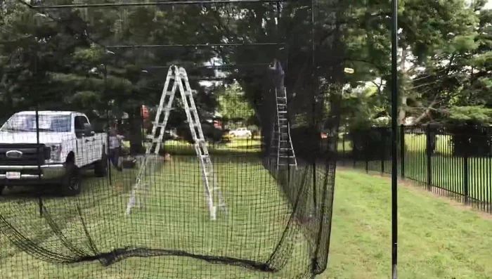 Install the turf, net savers, heating mat, and other finishing touches.