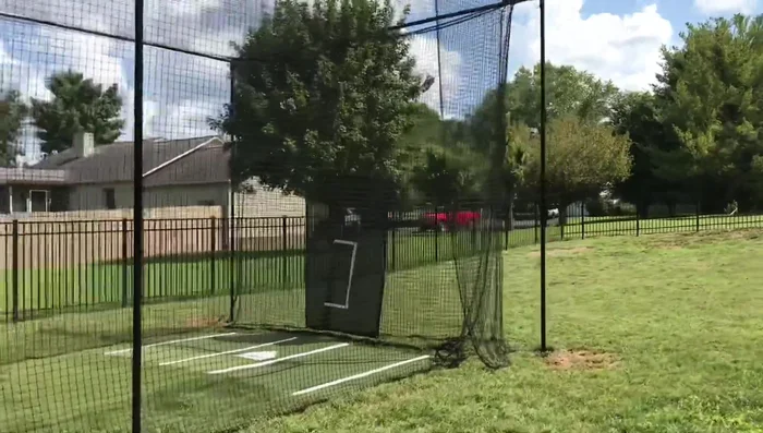 Install the turf, net savers, heating mat, and other finishing touches.