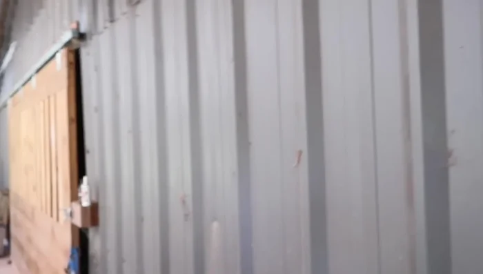 Run a main cable across the barn, securing it to the eye bolts.