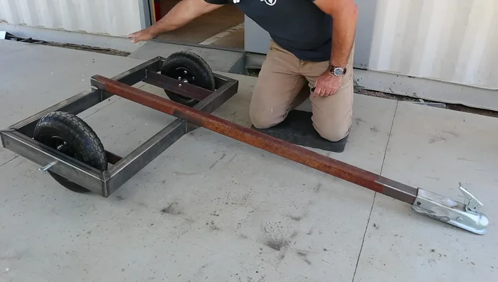 Weld the rake mechanism components securely, using a staggered welding technique to prevent warping.