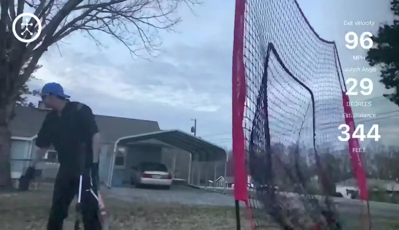 A ball impacting the top edge of the net