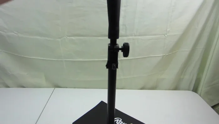 Close-up examination of the tee's top, emphasizing its squishy texture.