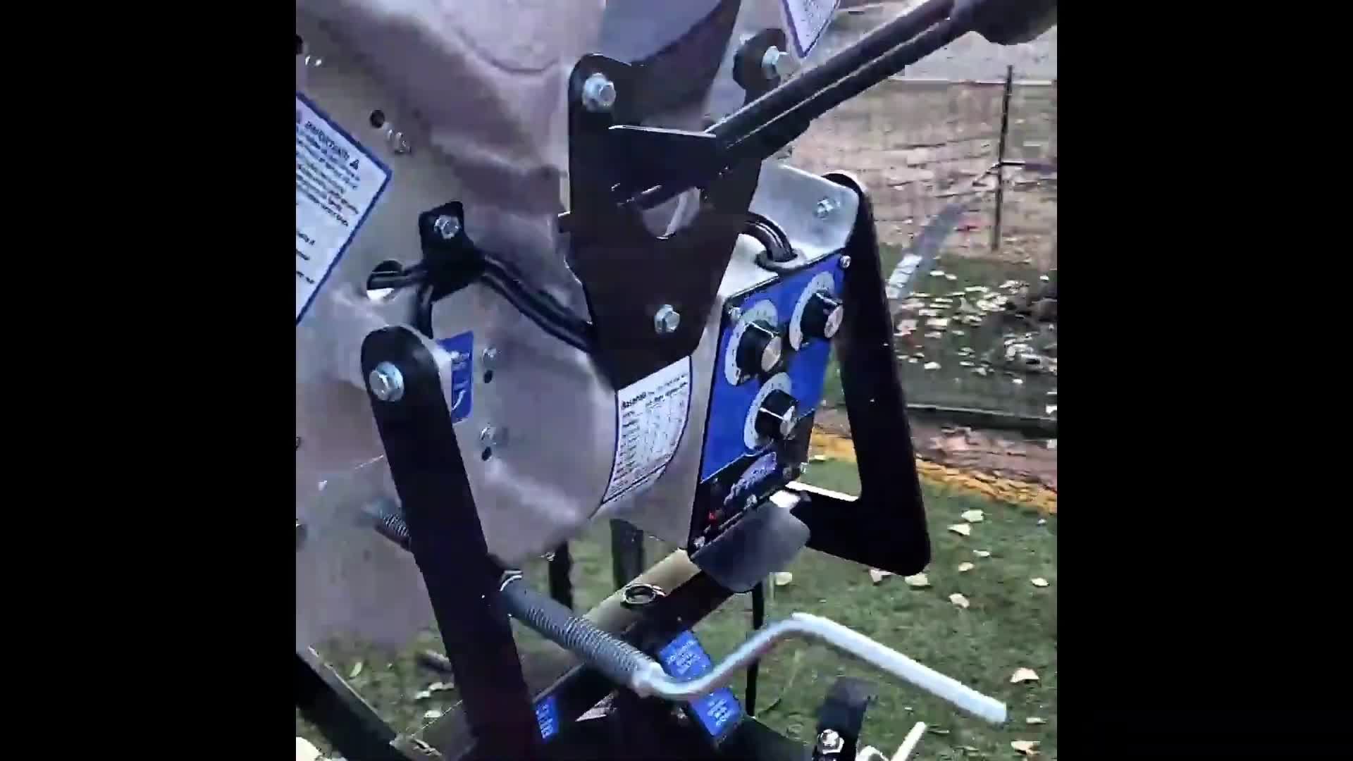 Close-up of the Hack Attack Jr. pitching machine.