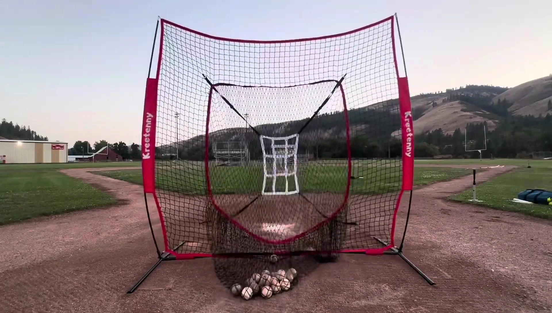 The net effectively catching baseballs