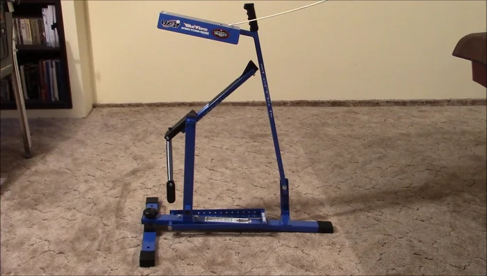 Attach the ball shield using a Phillips head screwdriver.