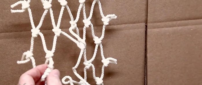 Secure the knot ends: Burn the ends of the twine to prevent unraveling and melt them to the knot. Use a flathead screwdriver to press the ends against the knot if needed, adding extra security.