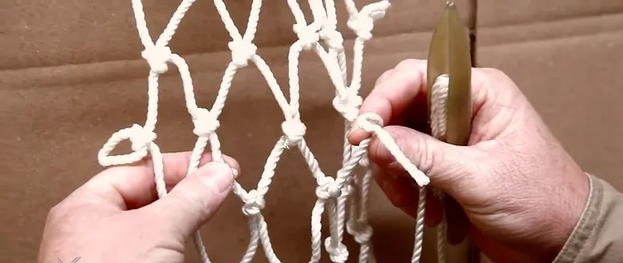 Tie off the repair: Carefully tie a square knot, maintaining the correct spacing between knots. Avoid a granny knot as it won't hold securely.