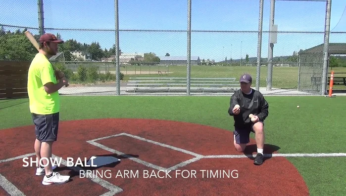 Bring your arm back smoothly, allowing the batter time to load.