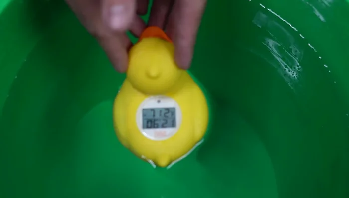 Dunk the Glove: Submerge the glove in lukewarm water (approximately 70°F) for 25-60 seconds, repeating the process several times for optimal saturation.