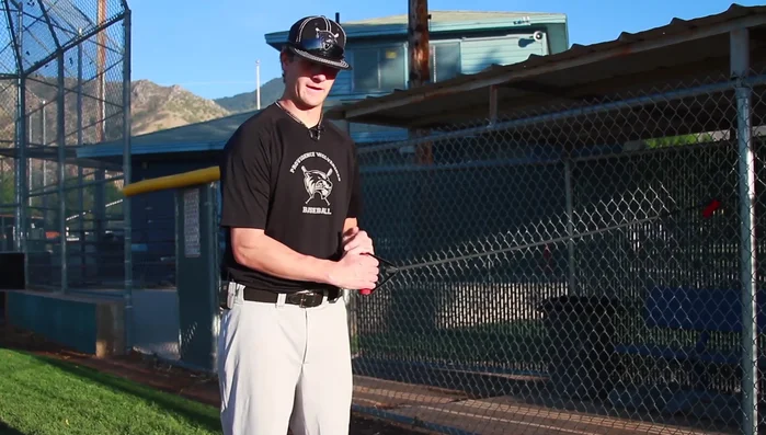 **Back (Shoulder):** Take a step closer to the anchor point. With your elbow at your side and parallel to your shoulder, pull the band slowly. This is a more challenging variation focusing on the posterior deltoid.