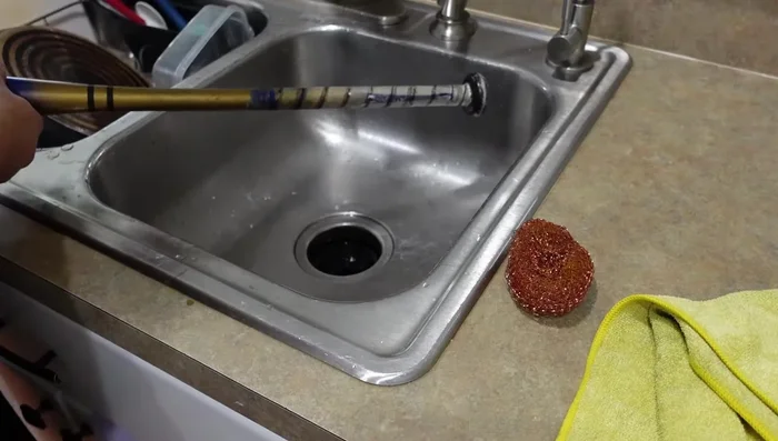 Clean the bat handle. Rinse with dish soap to remove any residue and ensure a clean, non-sticky surface.