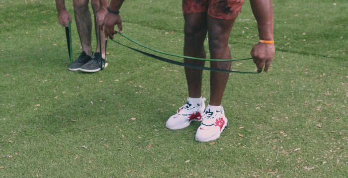 Banded Lat Pull-Down: High anchor point. Perform with protraction, retraction, and pull for each rep.