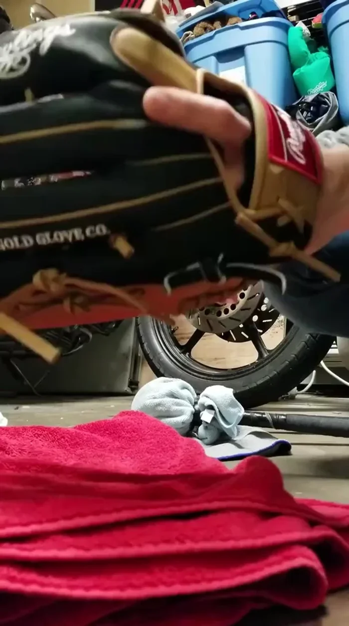 Once dry, apply a light coat of glove oil (like Nocona) to loosen it up further.