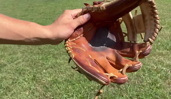 Clean the glove. Wipe off any loose dirt and grime.