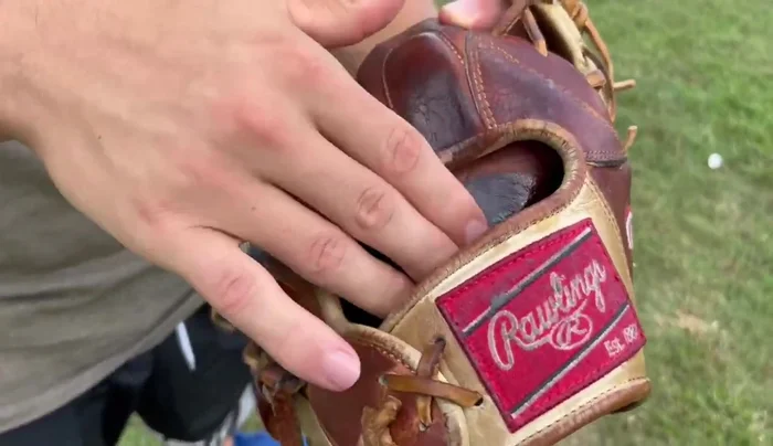 Condition the palm liner. Apply a small amount of conditioner to the palm liner to keep it soft and prevent ripping.