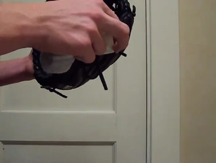 Focus on oiling the break points of the glove (where it creases when closed), to prevent cracking.