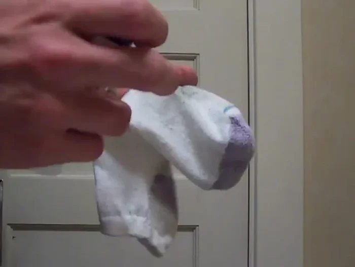 Apply a small amount of oil (nickel to quarter-sized) to your rag/sock/sponge.