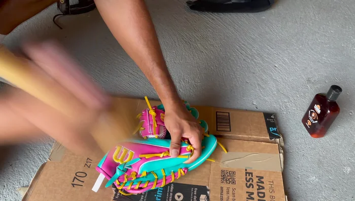 Pound Break Points: Use the mallet to pound repeatedly at each hinge, focusing on the areas mentioned above. This creates the hinges and helps the glove fold naturally.