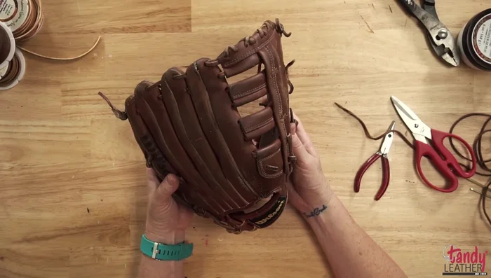 Repeat steps 4 & 5 until the entire glove is re-laced.