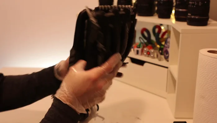 Repeat steps 2 and 3 a couple of times. In the final treatment, immediately after removing from the oven, insert a baseball into the glove pocket, secure with a strap or twine, and let cool to form the pocket.