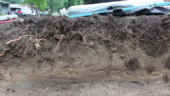 Heavier traffic (driveways) requires significantly more excavation than pedestrian traffic (patios/walkways).