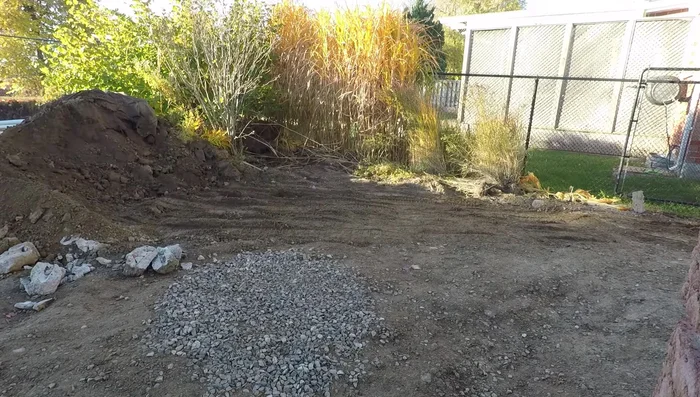 Heavier traffic (driveways) requires significantly more excavation than pedestrian traffic (patios/walkways).