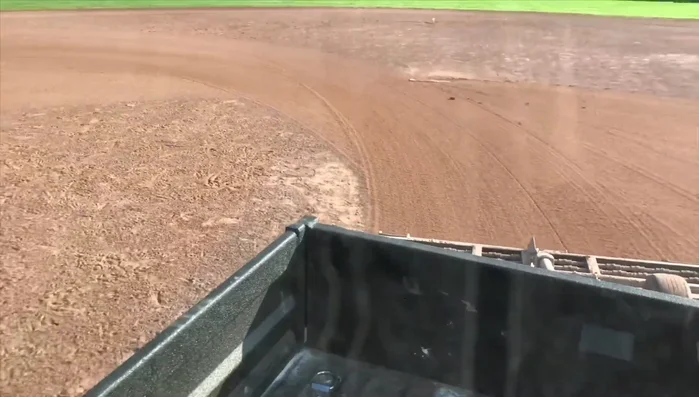 Fill in Batter's Boxes: Carefully drive over home plate and fill in the batter's boxes to ensure a smooth, level playing surface.