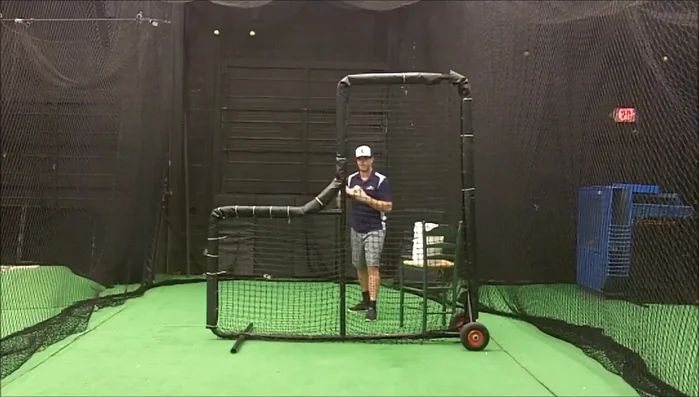 Load up and throw, ensuring your arm extends fully, and then tuck your body behind the screen immediately after the release.