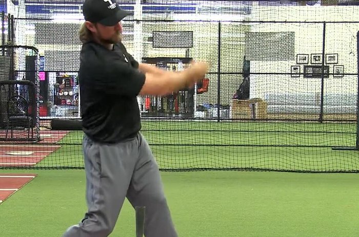 Move the tea to the middle contact point. Take 5 swings at each height, focusing on line drives up the middle.
