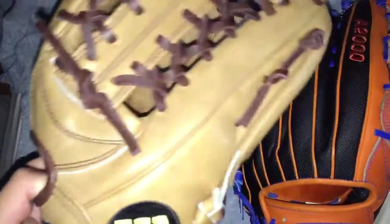 The reviewer demonstrating his preferred method of squeezing a baseball glove.