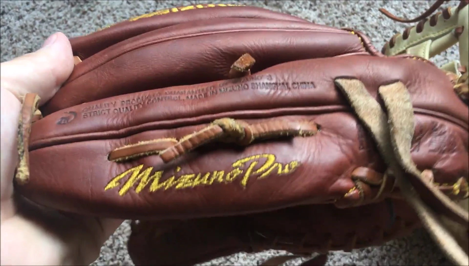 Close-up showing the stitching details of the Mizuno Pro Limited.