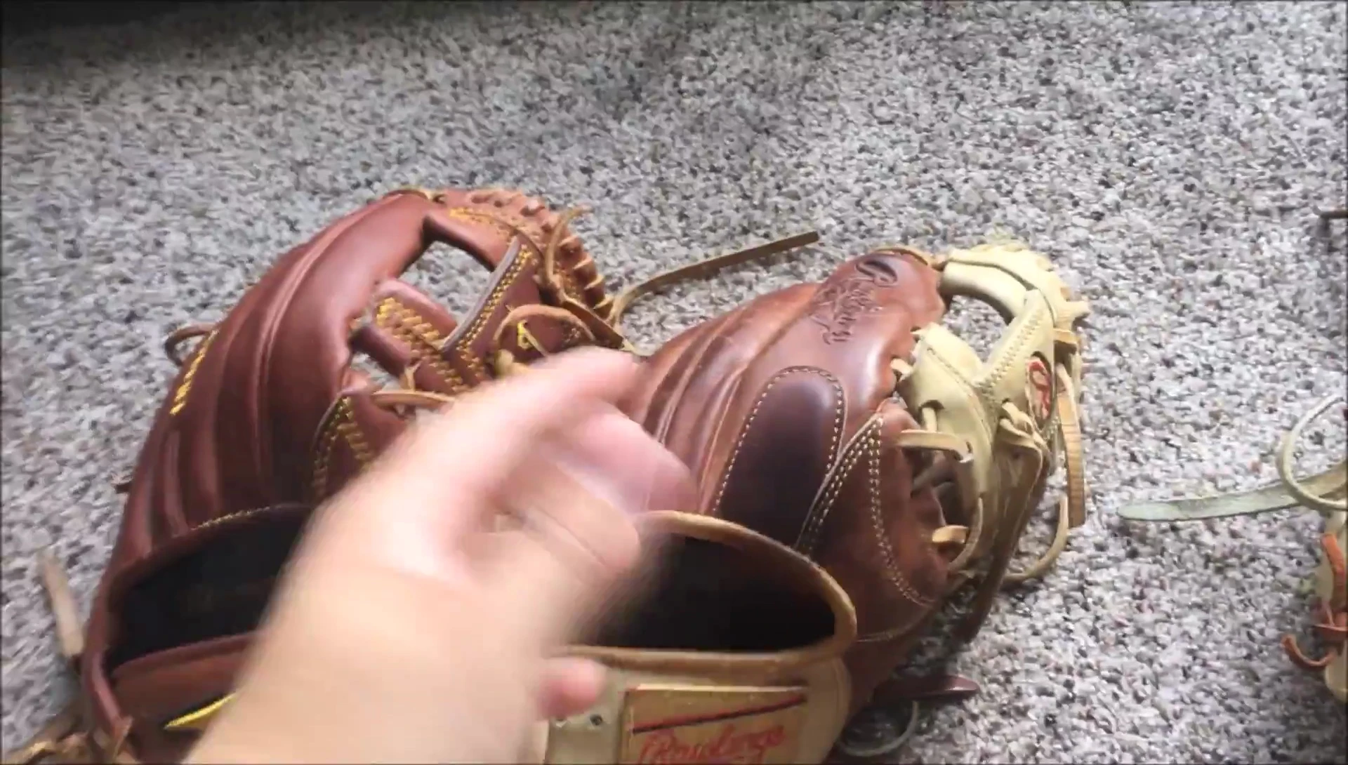 Shot showing the fielder using the Rawlings glove for ground ball.