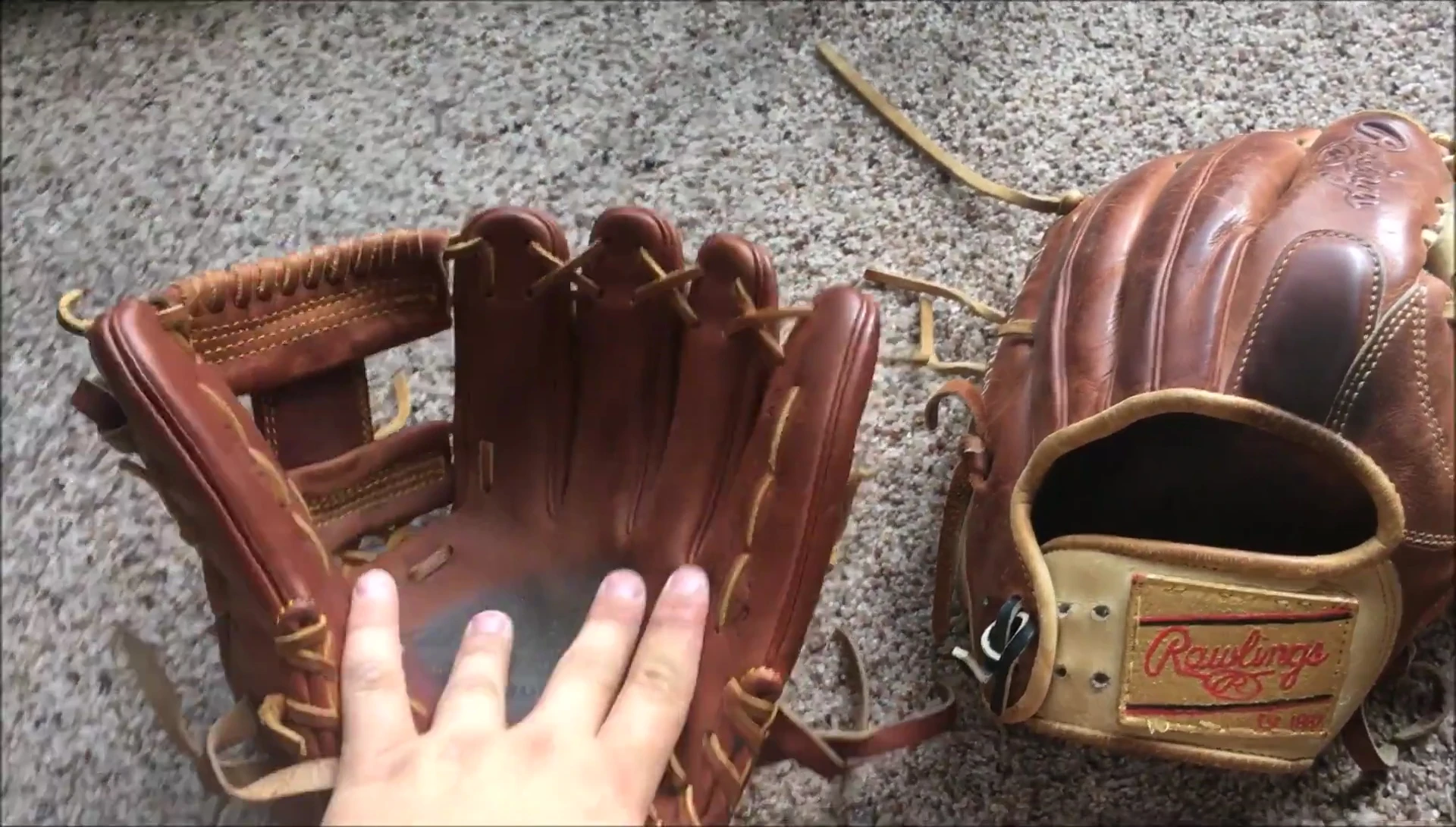 Shot emphasizing the flat finger stalls of the Rawlings glove.