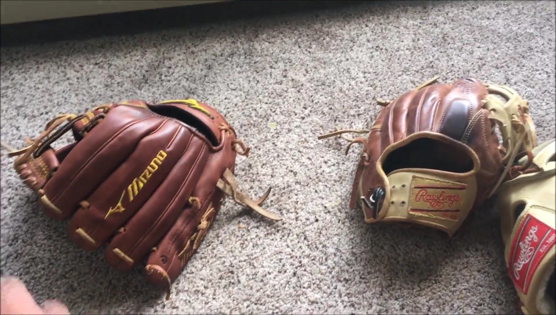 Side-by-side shot of both gloves summarizing the comparison.