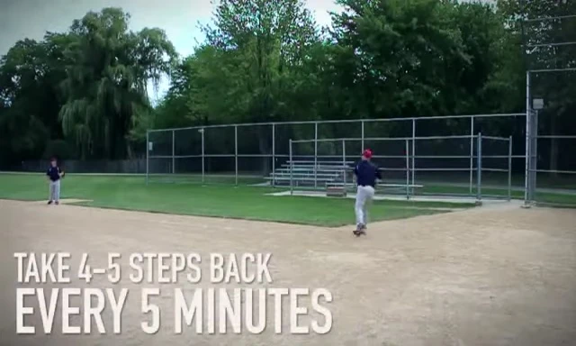 Gradually increasing the throwing distance during the warm-up.