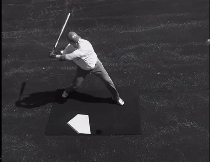 Continue pulling, keeping the bat head back until it passes your shoulders.