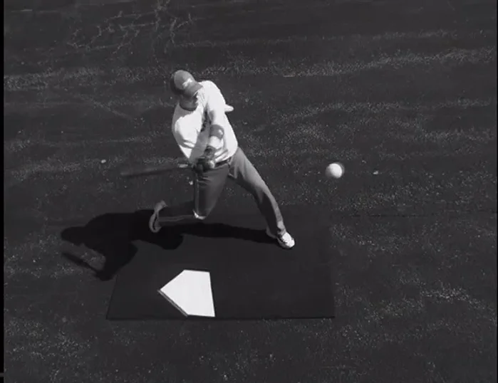 Continue pulling, keeping the bat head back until it passes your shoulders.