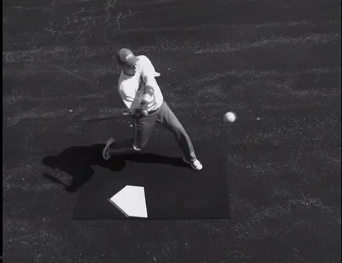 Continue pulling, keeping the bat head back until it passes your shoulders.