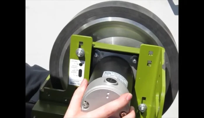 Let the motor assembly drop gently into the slots.