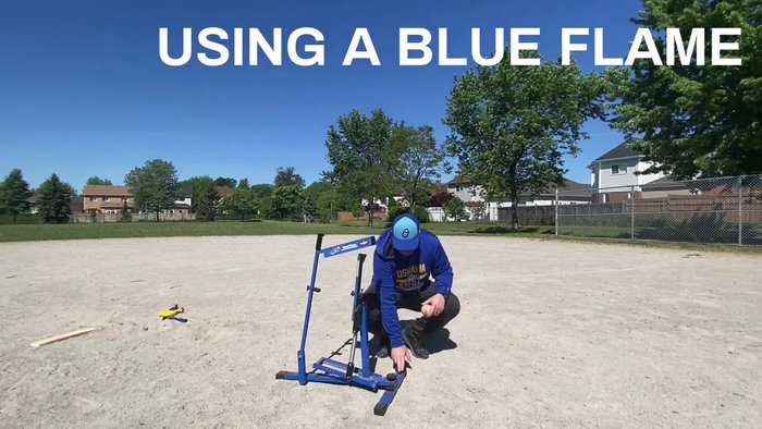 Secure the machine to the ground using stakes to hold the front foot.